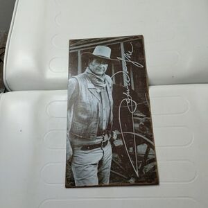 John Wayne tin sign
